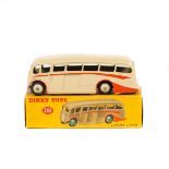 Dinky Toys Luxury Coach (281). An example in cream with orange coach lines and cream wheels and