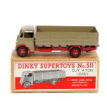 Dinky Supertoys Guy 4 Ton Lorry (511). An example in fawn with red chassis, wings and wheels, with