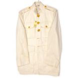 A US Marine Corps white tropical jacket, gilt buttons, with pair overalls, maker’s labels with