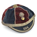 A 1914 regimental cricket cap of The R. Fusiliers, of dark blue and crimson velvet, with silver lace