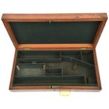 A late 19th century fitted mahogany pistol case, for an 11¾” saloon pistol or similar (?), with dark