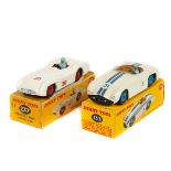 2 Dinky Toys racing cars. Cunningham C-5R Road Racer (133). In off white with twin blue racing