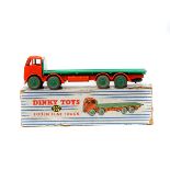 A Dinky Toys Foden Flat Truck (902). An example with orange cab and chassis, green flatbed and