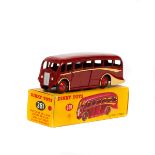Dinky Toys Luxury Coach (281). An example in maroon with cream coach lines and bright red wheels