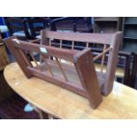 A TEAK MAGAZINE RACK