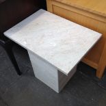 A TRAVERTINE PILLAR TABLE H51CM W54CM D38CM