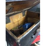 AN OLD TOOL BOX WITH TOOLS