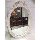 A LAURA ASHLEY ORNATE WHITE OVAL MIRROR H66CM W41CM