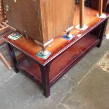 A MAHOGANY COFFEE TABLE