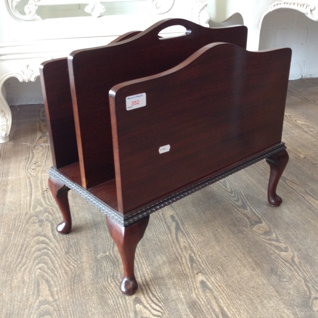 A MAHOGANY PAPER RACK