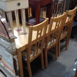 A MODERN LIGHTWOOD TABLE AND AND SIX CHAIRS