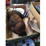 A BOX WITH SOFT TOYS AND SHOE TREES