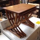 A RETRO TEAK NEST OF TABLES