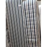 A STRIPED SINGLE DIVAN BED