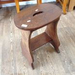 A CARVED OAK STOOL H56.5CM