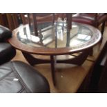 A RETRO ROUND COFFEE TABLE WITH CARVED DETAIL AND GLASS TOP DIAM 90CM H 45CM