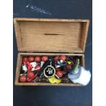 AN OLD WOODEN BOX OF COSTUME JEWELLERY C