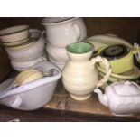 SHELF OF CHAMBER POTS AND OTHER POTTERY