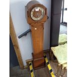 A DECO STYLE OAK CASED GRANDDAUGHTER CLOCK