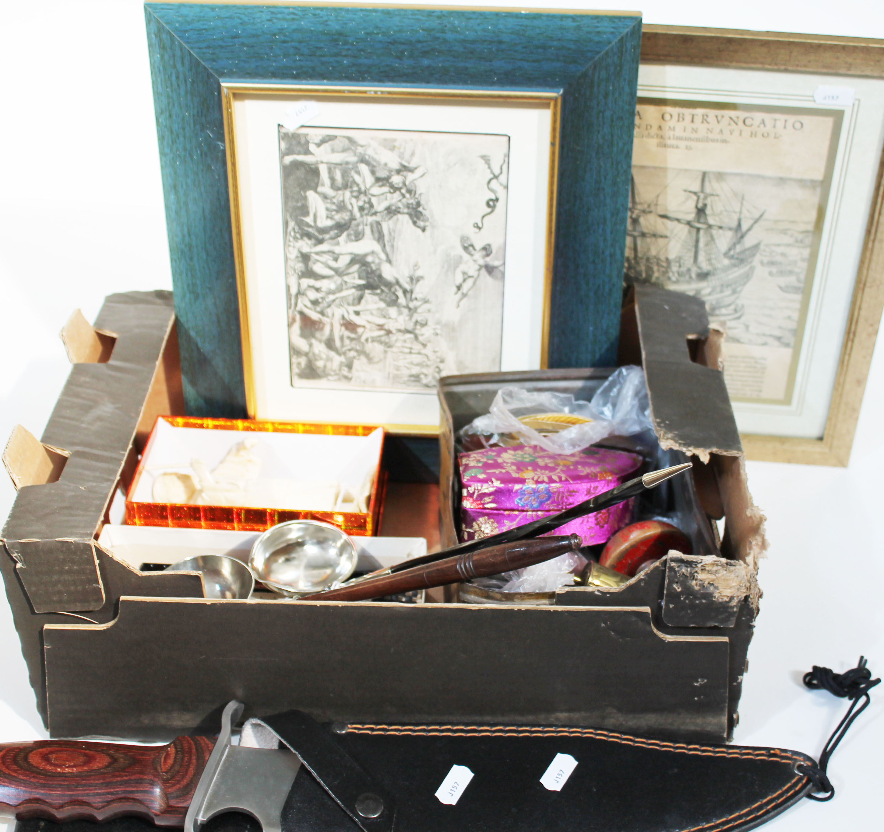 A box of misc including two toddy ladles, a bowie knife, two prints, two bone/ivory carvings, sewing