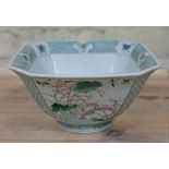 A Chinese porcelain bowl of hexagonal form, six character Xuantong mark to base, length 21cm.