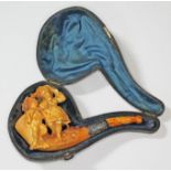 A silver mounted meerschaum pipe with butterscotch amber mouthpiece.