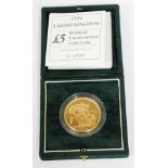 A Queen Elizabeth II 1996 gold proof five pound coin, boxed with certificate.