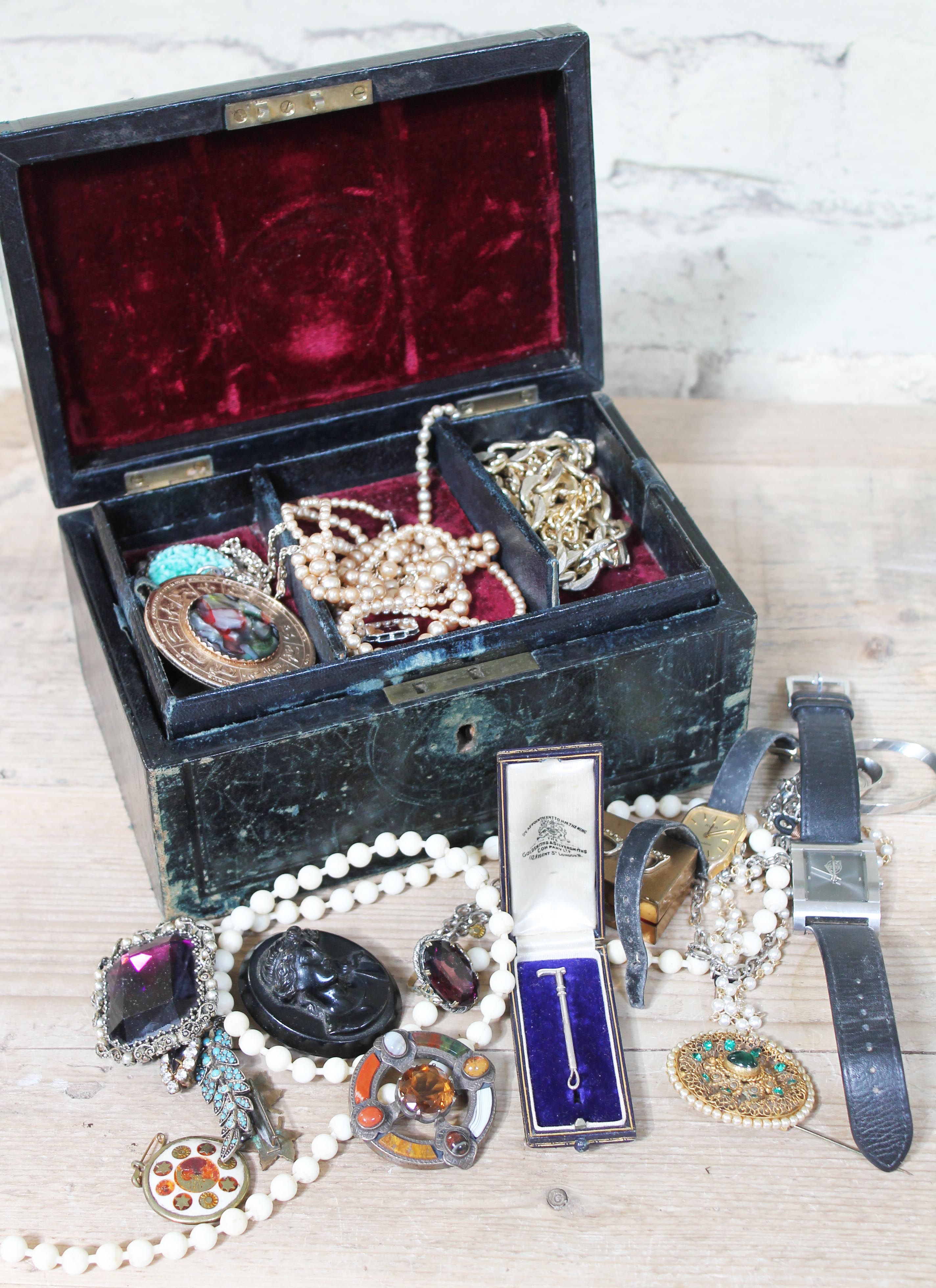 A Victorian jewellery box and contents including a riding crop brooch marked 'Sterling', a