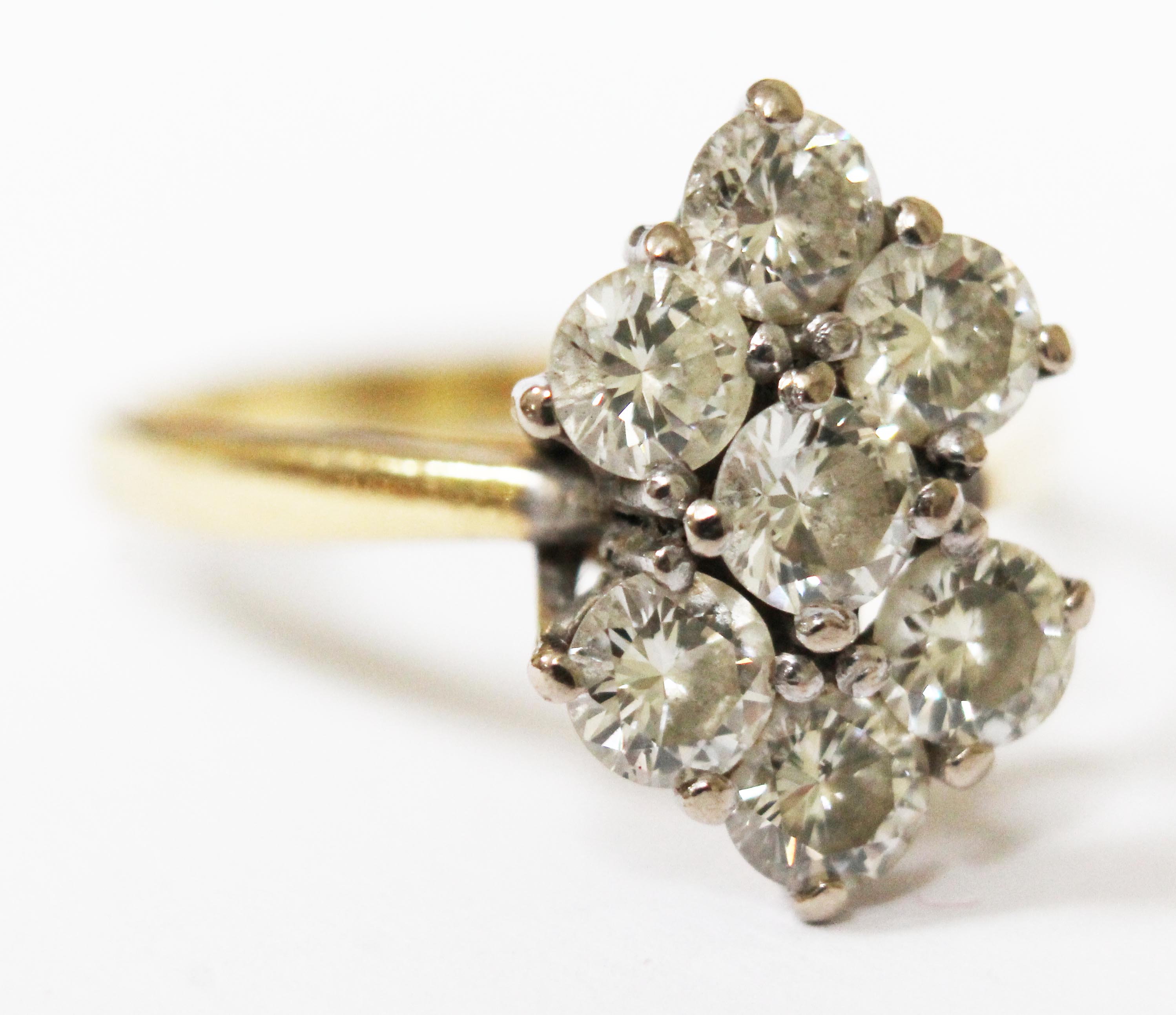 A seven stone diamond ring, total approx. diamond weight 1.40 carats, band hallmarked 18ct gold, - Image 3 of 11