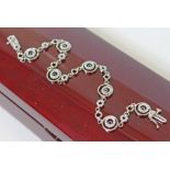 A white gold diamond bracelet, length 20cm, marked '18K' & '750', gross wt. 10.3g.