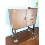 A teak chest of drawers on legs, width 73cm, depth 31cm & height 84cm.