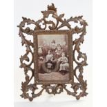 A Victorian ornate metal frame photo frame, height 28cm.