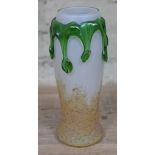 A Loetz style iridescent glass vase with applied green drips, height 21cm. Condition - minor nibbles