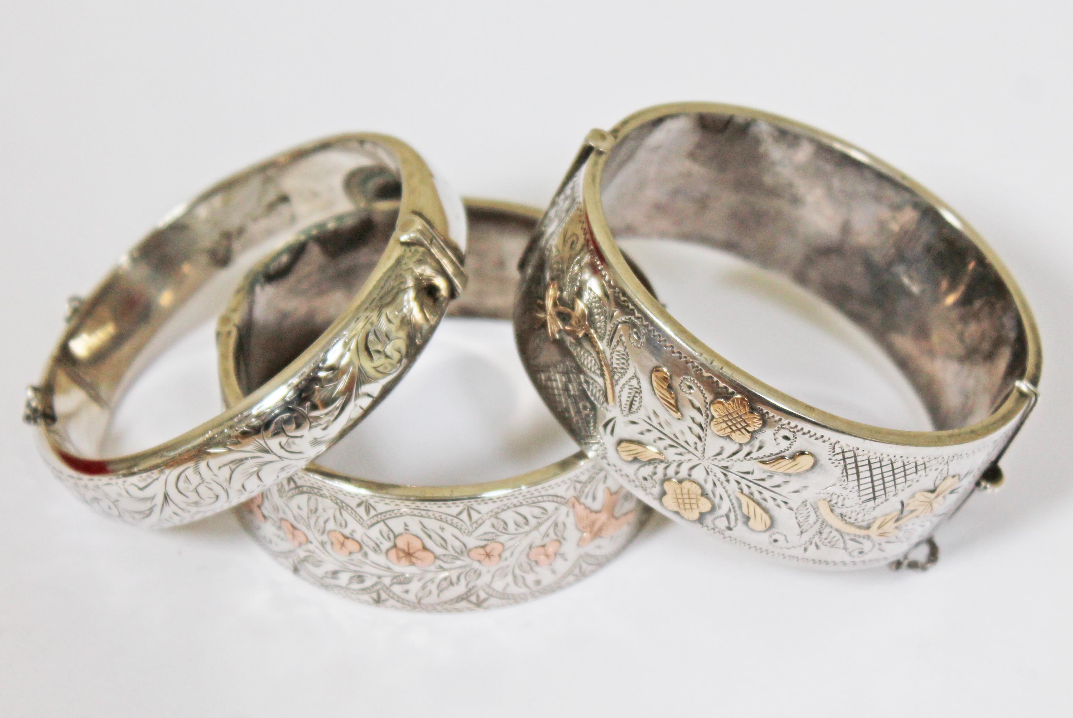 A group of three hallmarked silver bangles.