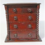 A 19th Century apprentice chest, height 29.5cm.