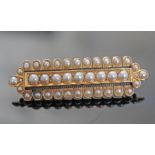 A Victorian yellow metal brooch set with half cut pearls, length 48mm, unmarked, probably 15ct,