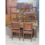 A carved oak drawer leaf table and eight chairs circa 1920, minimum table length 138cm, depth 96.5cm