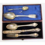 A mixed lot of hallmarked silver comprising a christening set and two other spoons.