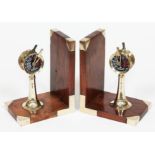 A pair of teak bookends with mounted miniature ships telegraphs, height 18cm.