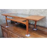 A G-Plan teak and glass coffee table, length 137cm, depth 51cm & height 42.5cm.