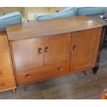 An Ercol elm sideboard, length 114cm, depth 49cm & height 81cm.