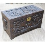 An Oriental profusely carved chest, length 106cm, depth 52cm & height 61cm.