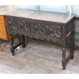 A 1920s geometric oak two drawer dresser base or side table, length 114cm, depth 42cm & height