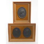 Three Wedgwood black basalt commemorative plaques, framed.