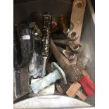 A box of tools including cold chissels, spirit level, spanners, etc