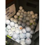 A crate with 100 Nike golf balls