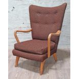 A retro lounge chair, width 68cm, 75cm & height 97cm.