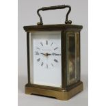 A brass striking carriage clock by Matthew Norman London, height 17cm. Condition - comes with an