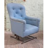 An unusual Victorian rocking chair, blue buttoned upholstered top section afixed to metal base