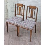 A pair of late Victorian inlaid rosewood bedroom chairs.